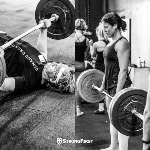 A man does a barbell floor press while a woman stands at the top of a barbell deadlift.