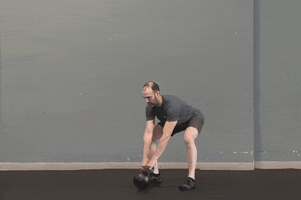 Coach Ryan demonstrates kettlebell swings with a well-timed hinge.